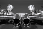 close front view of Capristo Racing Valved Exhaust with Headers and Cat Delete (CES3) for Porsche 987 Boxster/Cayman MK2 2005-2012 with black background