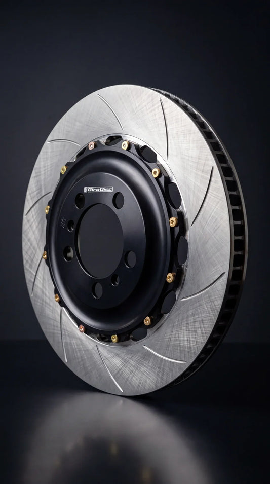 Girodisc two-piece floating brake rotor with black aluminum hat and gold drive pins