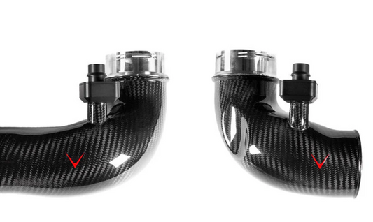 eventuri carbon fiber turbo inlets laid side by side with white background and red V logo