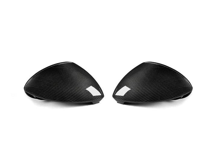 A front view of AUTOTECKNIC REPLACEMENT DRY CARBON MIRROR COVERS - PORSCHE 9Y0 CAYENNE 2019-2025 with white background