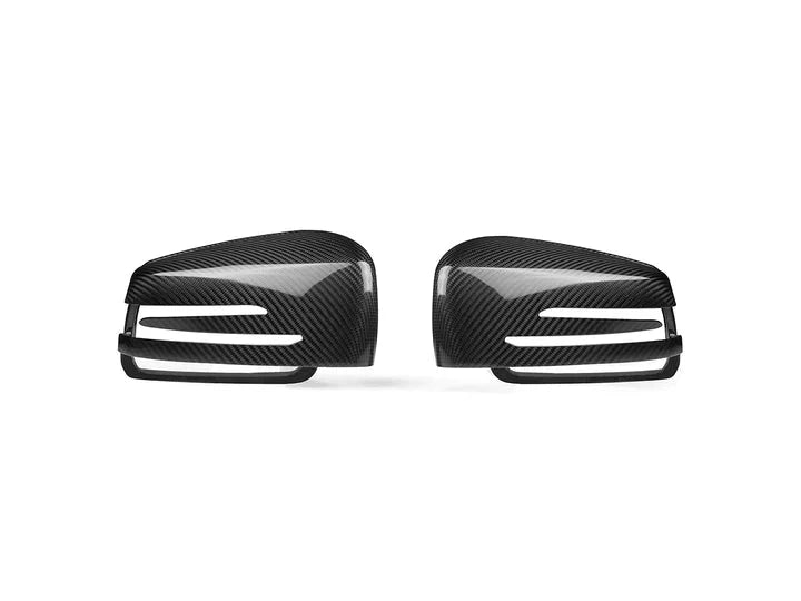 A front view of AUTOTECKNIC REPLACEMENT VERSION II DRY CARBON MIRROR COVERS - MERCEDES-BENZ SUV VEHICLES 2006-2019 with white background