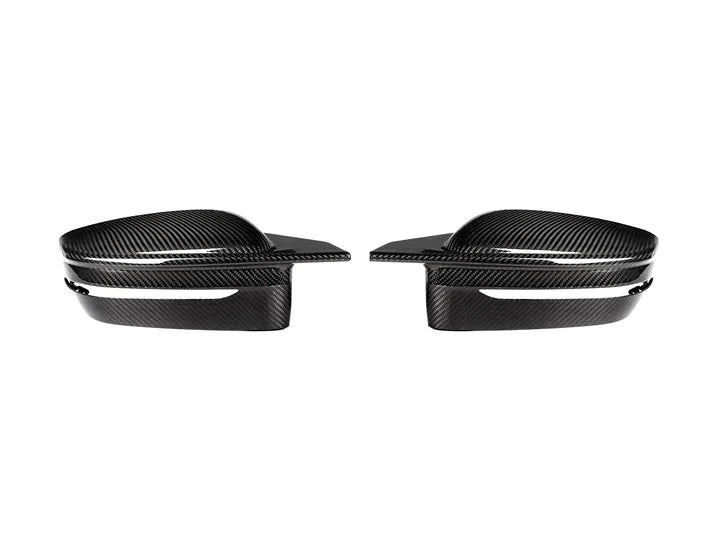 A front view of AUTOTECKNIC G8X STYLE M-INSPIRED VERSION II DRY CARBON MIRROR COVERS - BMW G42 2-SERIES 2021+ with white background