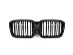 A front view of AUTOTECKNIC PAINTED DUAL-SLAT GLAZING BLACK FRONT GRILLE SET - G01 X3 | G02 X4 LCI 2022+ with white background
