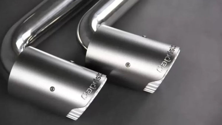 close view of Capristo Exhaust Valved Exhaust System with Capristo Alum. Tips for BMW M8 G16 Grand Coupe 2019+ with black background