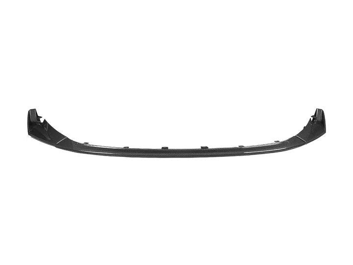 A front view of AUTOTECKNIC DRY CARBON COMPETITION SPORT FRONT AERO LIP - BMW G80 M3 | G82/ G83 M4 2021+ with white background