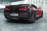 Black Corvette C7 Z06 rear three-quarter with the Capristo exhaust's quad center tips