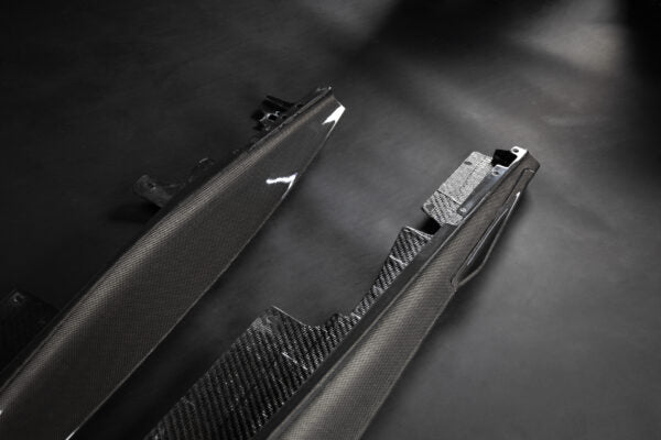 close view of Capristo Carbon Fiber Side Skirts (with Small Fin) for Ferrari Roma 2020-2024 with black background