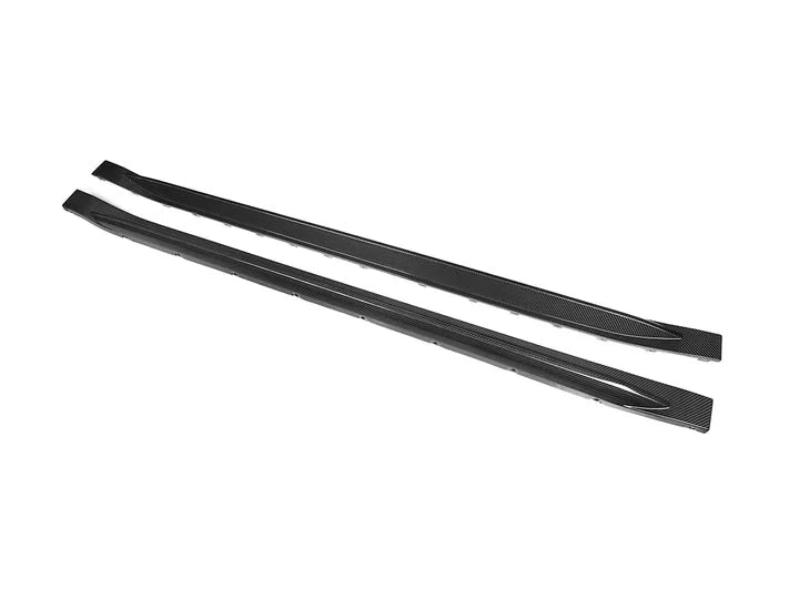 A top view of AUTOTECKNIC DRY CARBON OEM SPEC SIDE SKIRT - BMW G82/ G83 M4 2021+ with white background