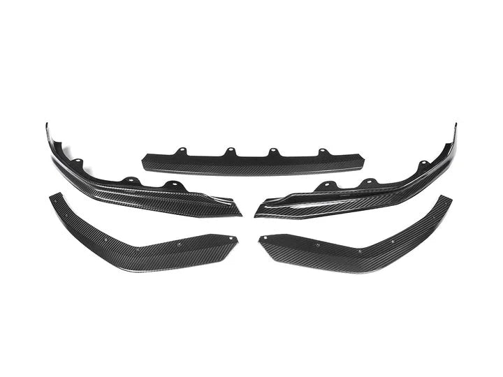 A front wide view of AUTOTECKNIC DRY CARBON PERFORMANTE FRONT LIP - BMW G20 3-SERIES M-SPORT PRE-LCI 2018-2022 with white background