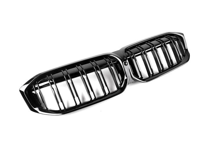 A front view of AUTOTECKNIC PAINTED GLAZING BLACK DUAL-SLAT FRONT GRILLE - G20 3-SERIES LCI 2022+ with white background