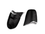 A front and back view of AUTOTECKNIC M-INSPIRED DRY CARBON MIRROR COVERS - BMW F25 X3 | F26 X4 | F15 X5 | F16 X6 2010-2019 with white background