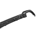 A close up view of AUTOTECKNIC DRY CARBON PERFORMANTE REAR DIFFUSER - BMW G20 M340I PRE-LCI 2019-2022 with white background