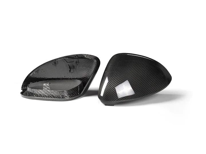 A back view of AUTOTECKNIC REPLACEMENT DRY CARBON MIRROR COVERS - PORSCHE 9Y0 CAYENNE 2019-2025 with white background