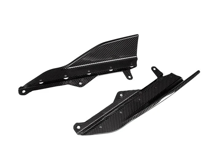 A top side view of AUTOTECKNIC CARBON FIBER SIDE SKIRT WINGLETS Gloss Carbon Finish - BMW G42 2-SERIES 2022+ with white background