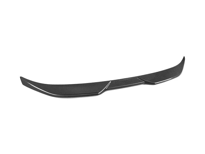 A side wide view of AUTOTECKNIC DRY CARBON PERFORMANCE TRUNK SPOILER - BMW G87 M2 2023+ with white background