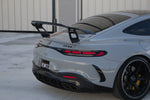 Carbon rear wing on a grey AMG GT from the rear quarter - Carbon Fiber Rear Wing for the 2024-2026 AMG GT 55 / GT 63 Coupe