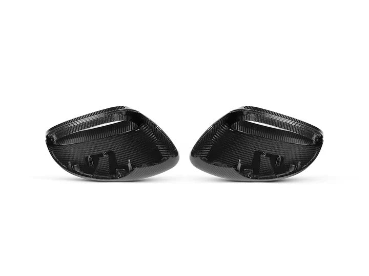 A back view of AUTOTECKNIC REPLACEMENT DRY CARBON MIRROR COVERS - PORSCHE 971 PANAMERA 2017-2023 with white background