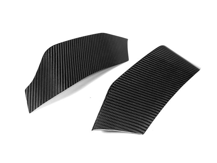 A back close up view of AUTOTECKNIC DRY CARBON CORSA BUMPER TRIM - BMW F80 M3 | F82/ F83 M4 2014+ with white background