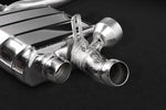 Close-up of polished twin round outlets and valve on Capristo Cayenne 958.2 Turbo exhaust