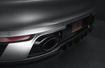 A close up view of TECHART Sport Design Rear Bumper Multi-part Diffuser Porsche 992 Carrera & Targa fitted on a car