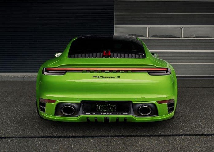 A wide back view of TECHART Rear Spoiler I Porsche 992 Carrera & Targa fitted on a neon car