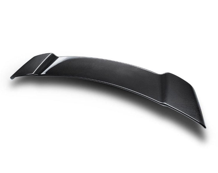A top view of TECHART Matt Carbon Rear Spoiler I Porsche 992 Turbo /S with white background