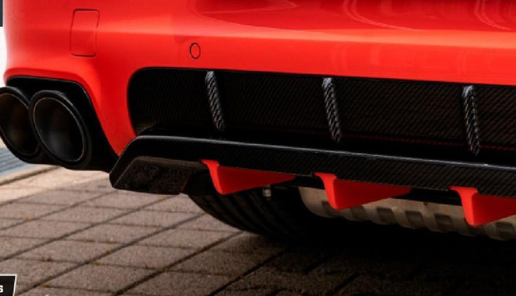 A close up view of TECHART Rear Diffusor In Body Color Porsche Cayenne