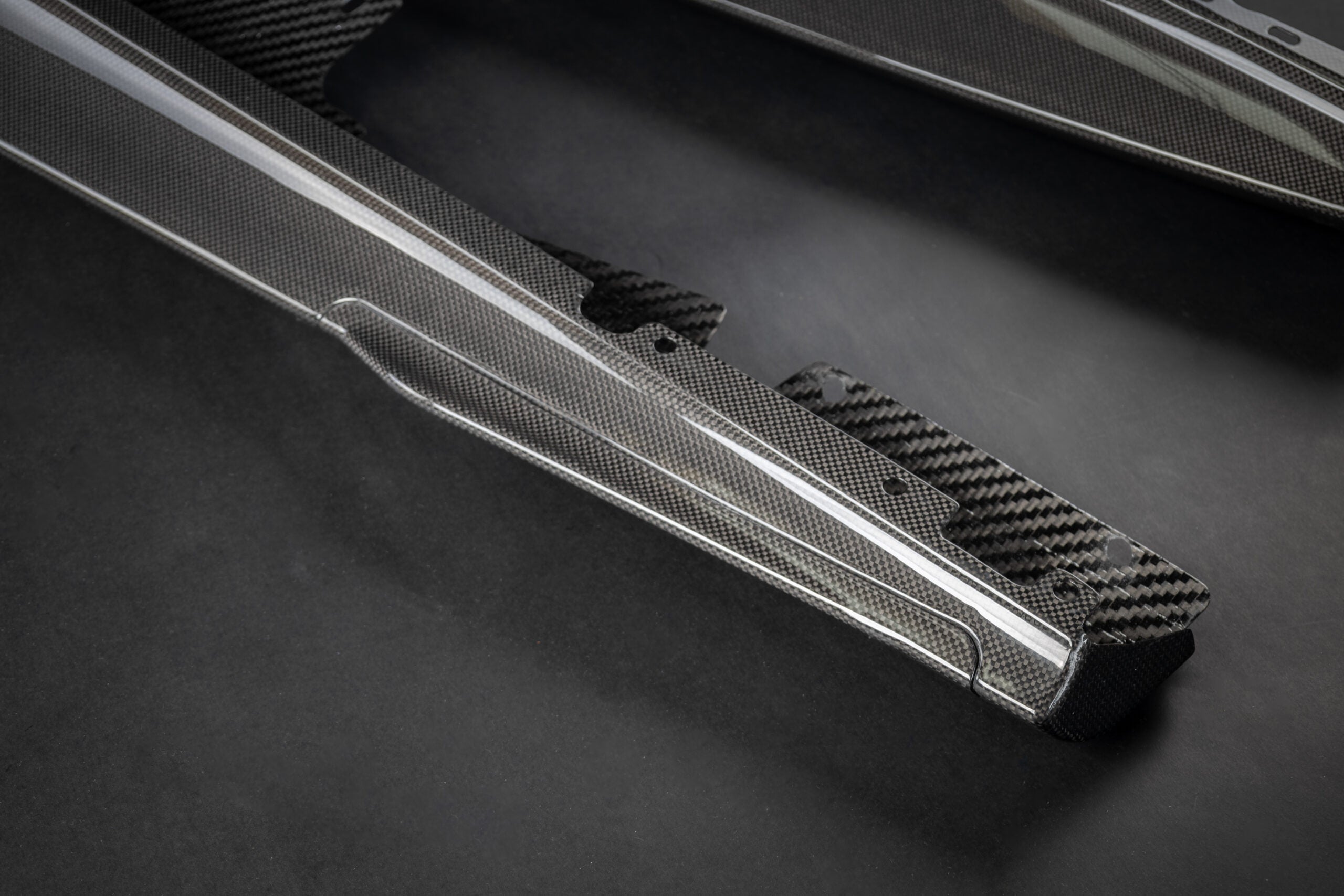 Capristo Ferrari Roma carbon side skirt, angled view