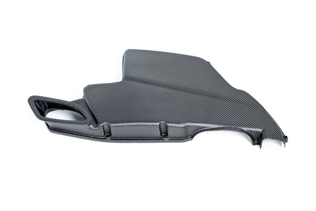 Black carbon fiber airbox lid with angular curved shape featuring integrated intake opening and multiple mounting tabs along the bottom edge - Eventuri airbox lid for BMW M3