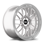 Silver alloy wheel with multi-spoke design and stepped lip, positioned at angle showing face and barrel profile - APEX Wheels wheel for 20x11.5 ET72 5x130 - Race Silver - Machined Lip