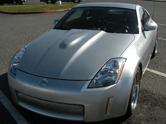 wide view of Stillen Power Hood [Fiberglass Series 1] for Nissan 350Z [Z33] 2003-2006 fitted inside a car