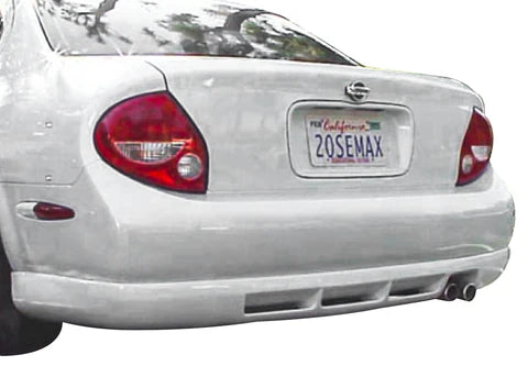 wide view of Stillen Rear Valance for Nissan Maxima 2000-2003 fitted inside a car