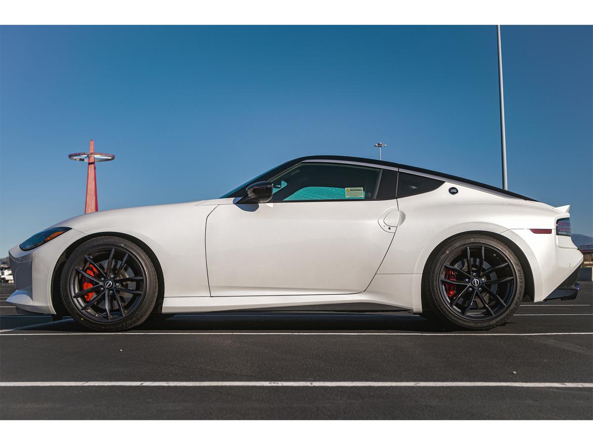 A wide side view of the Nissan Z RZ34 from the back on the road fitted with Swift Springs Spec-R Lowering Springs 
