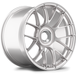 Silver forged aluminum wheel with multi-spoke design and polished finish, shown at three-quarter angle on clean white background - APEX Wheels wheel for 19x12 ET46 PSCL - Race Silver