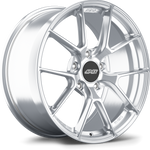 Silver alloy wheel with ten-spoke design, brushed finish, and black center cap on white background - APEX Wheels wheel for 19x9 ET34 5x112 - Brushed Clear
