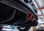 close view of Capristo Valved Exhaust with Carbon Tips (CES3) for Lotus Evora/S 2010–2015 fitted inside a car