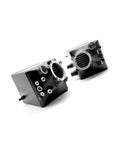 Twin chargecoolers viewed from above with both circular outlets visible