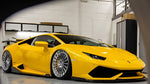 Yellow Lamborghini Huracan fitted with the Urban carbon aero kit and rear wing