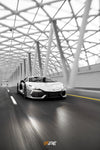 White Lamborghini Revuelto with IPE exhaust, front three-quarter view