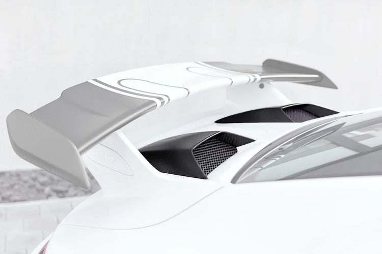 A close up view of TECHART Engine Air Intake Cover Carbon "matte" for Porsche 991.2 GT3 from MY17 with the cover highlighted