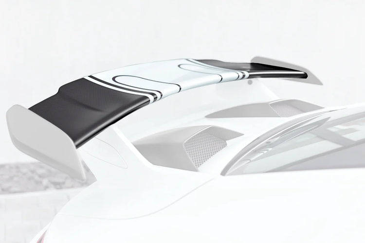 A close up side view of TECHART Rear Spoiler Profile Carbon "matte" for Porsche 991.2 GT3 from MY17 fitted on a car with the spoiler highlighted