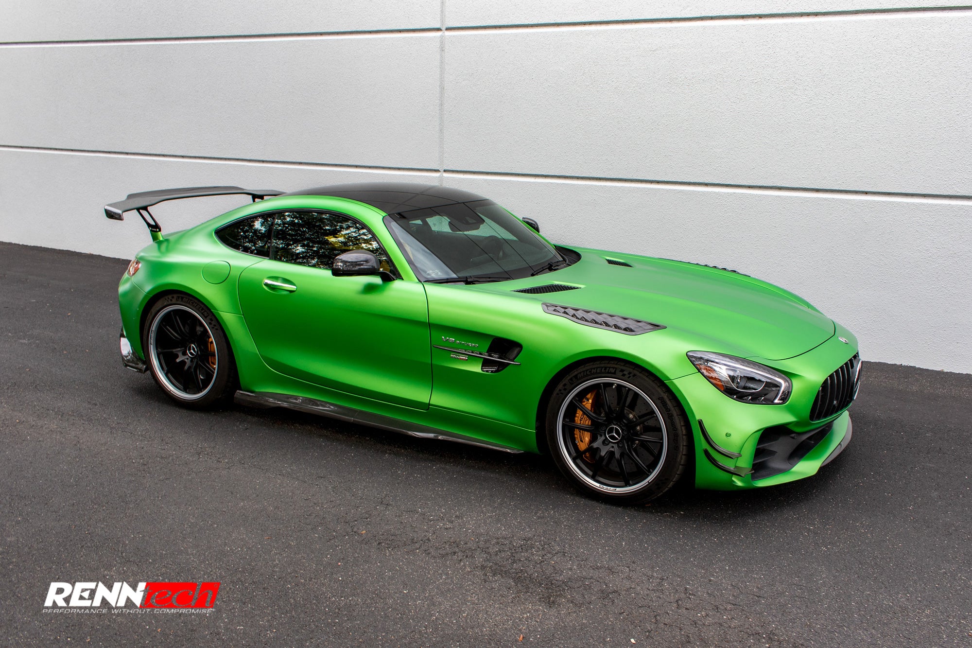 Green AMG GT R car rear three-quarter with the side skirts - Carbon Fiber Side Skirts for the 2018-2021 AMG GT R / GT R Pro