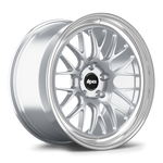 Silver alloy wheel with multi-spoke design and polished lip, displayed at three-quarter angle showing face and barrel - APEX Wheels wheel for 19x9.5 ET25 5x112 - Brushed Clear - Machined Lip
