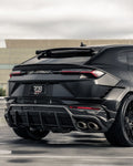 Black Lamborghini Urus rear three-quarter showing the rear diffuser