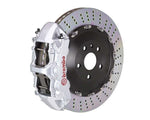 A front view of Brembo GT Front Big Brake Kit 405x34 2-Piece 6-Piston Drilled Rotors Volkswagen Tiguan R (Mk2) in silver calipers with white background