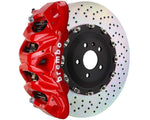 A front view of Brembo GT Front Big Brake Kit 412x38 2-Piece 8-Piston Drilled Rotors for Cadillac Escalade V-Series in red caliper with white background