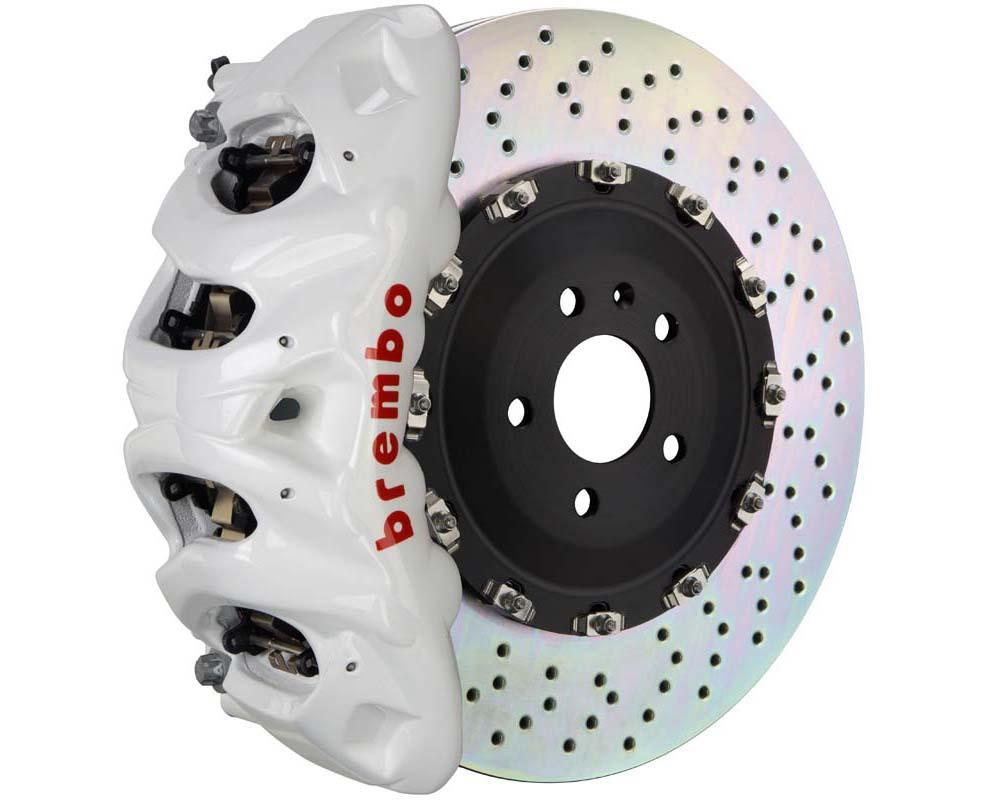 A front view of Brembo GT Front Big Brake Kit 412x38 2-Piece 8-Piston Drilled Rotors for Cadillac Escalade V-Series in white caliper with white background