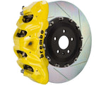 A front view of Brembo GT Front Big Brake Kit 412x38 2-Piece 8-Piston Slotted Rotors for Cadillac Escalade V-Series in yellow caliper with white background