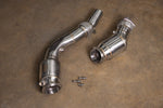 An overhead shot of a Valvetronic Designs 400 Cell Catted Downpipe kit for BMW F8X M2C, M3, and M4.