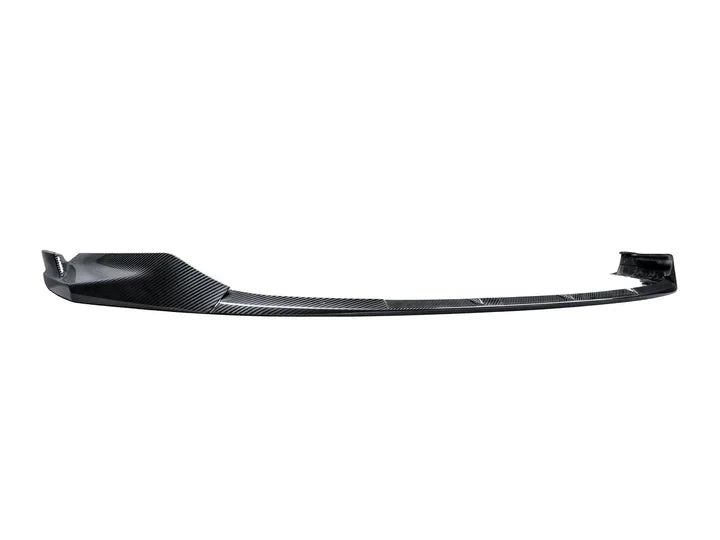 A front view of AUTOTECKNIC DRY CARBON FIBER PERFORMANTE FRONT AERO LIP - BMW G80 M3 | G82/ G83 M4 2021+ with white background
